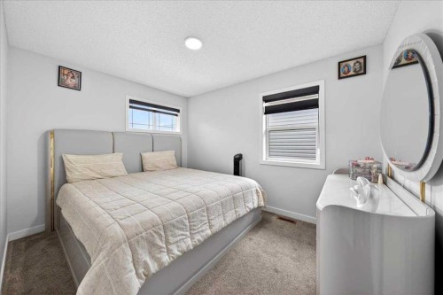 7 Redstone Park Ne, Calgary, AB - Indoor Photo Showing Bedroom