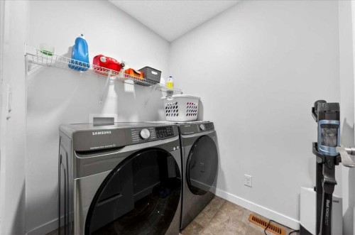 7 Redstone Park Ne, Calgary, AB - Indoor Photo Showing Laundry Room