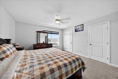7 Redstone Park Ne, Calgary, AB - Indoor Photo Showing Bedroom