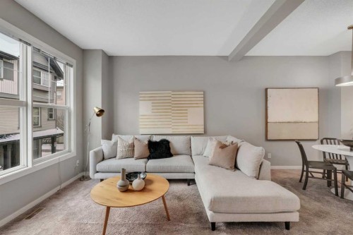 34 New Brighton Point Se, Calgary, AB - Indoor Photo Showing Living Room