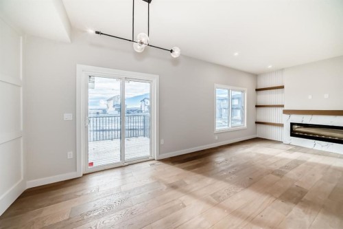 512 Heritage Boulevard, Cochrane, AB - Indoor With Fireplace