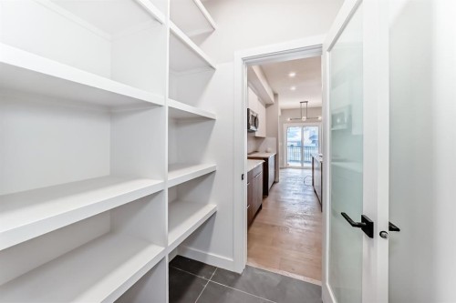 512 Heritage Boulevard, Cochrane, AB - Indoor With Storage