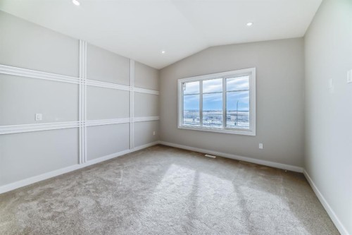 512 Heritage Boulevard, Cochrane, AB - Indoor Photo Showing Other Room