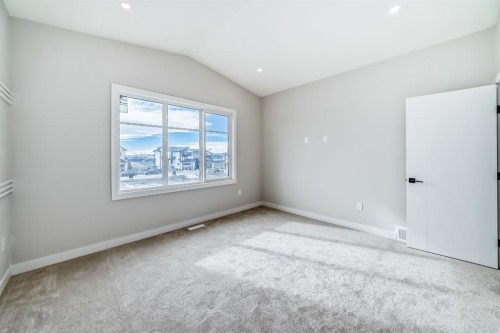 512 Heritage Boulevard, Cochrane, AB - Indoor Photo Showing Other Room