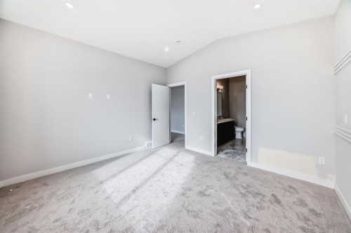 512 Heritage Boulevard, Cochrane, AB - Indoor Photo Showing Other Room