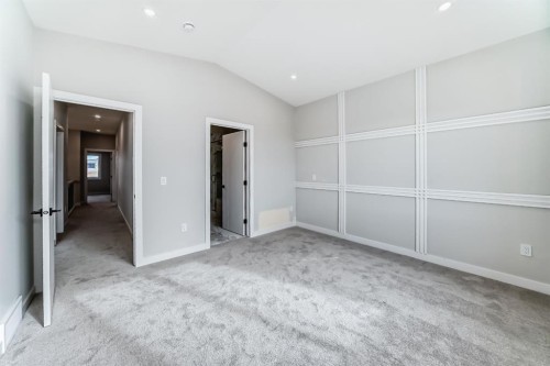 512 Heritage Boulevard, Cochrane, AB - Indoor Photo Showing Other Room