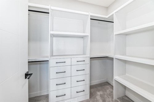 512 Heritage Boulevard, Cochrane, AB - Indoor With Storage