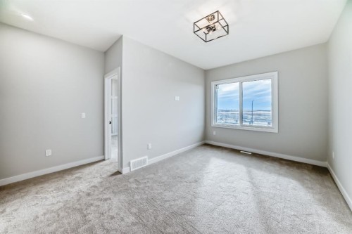 512 Heritage Boulevard, Cochrane, AB - Indoor Photo Showing Other Room