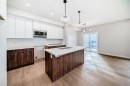 512 Heritage Boulevard, Cochrane, AB  - Indoor Photo Showing Kitchen 