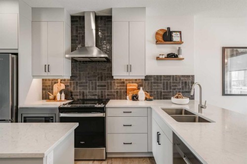  - Indoor Photo Showing Kitchen With Double Sink With Upgraded Kitchen