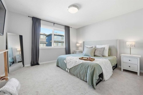 320 Sundown View, Cochrane, AB - Indoor Photo Showing Bedroom