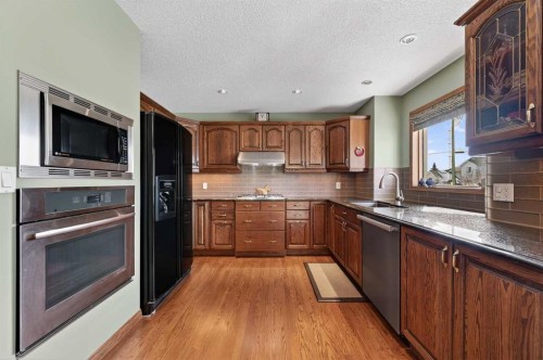 68 Hawkland Circle Nw, Calgary, AB - Indoor Photo Showing Kitchen