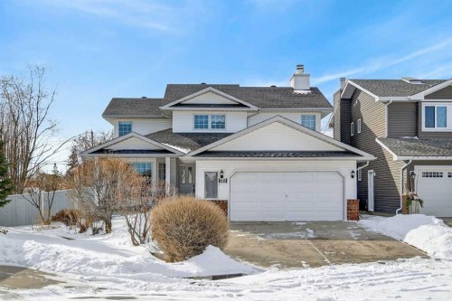 68 Hawkland Circle Nw, Calgary, AB - Outdoor With Facade