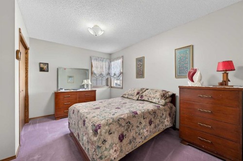 68 Hawkland Circle Nw, Calgary, AB - Indoor Photo Showing Bedroom