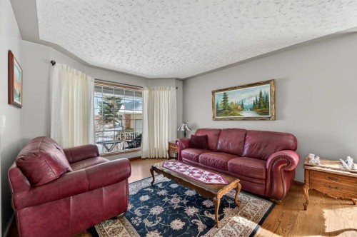 68 Hawkland Circle Nw, Calgary, AB - Indoor Photo Showing Living Room