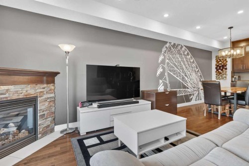 7104 36 Avenue Nw, Calgary, AB - Indoor Photo Showing Living Room With Fireplace