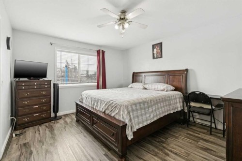 38 Canoe Square Sw, Airdrie, AB - Indoor Photo Showing Bedroom