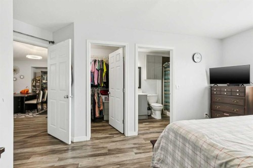 38 Canoe Square Sw, Airdrie, AB - Indoor Photo Showing Bedroom