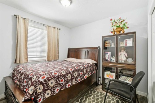 38 Canoe Square Sw, Airdrie, AB - Indoor Photo Showing Bedroom