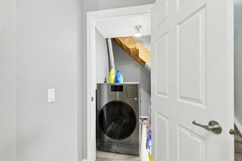 38 Canoe Square Sw, Airdrie, AB - Indoor Photo Showing Laundry Room