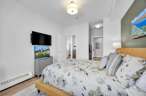210-38 Quarry Gate Se, Calgary, AB - Indoor Photo Showing Bedroom