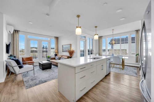 210-38 Quarry Gate Se, Calgary, AB - Indoor Photo Showing Kitchen With Upgraded Kitchen