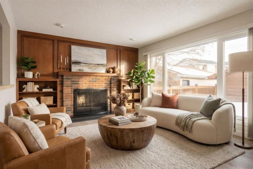 35 Shawmeadows Close Sw, Calgary, AB - Indoor Photo Showing Living Room With Fireplace