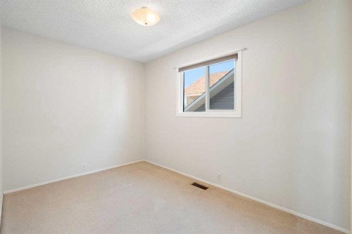 35 Shawmeadows Close Sw, Calgary, AB - Indoor Photo Showing Other Room