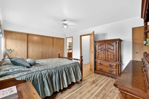 886 Erin Woods Drive Se, Calgary, AB - Indoor Photo Showing Bedroom