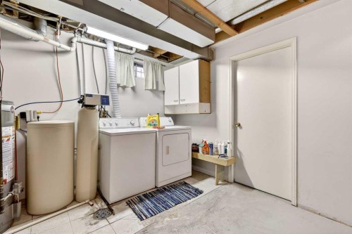 886 Erin Woods Drive Se, Calgary, AB - Indoor Photo Showing Laundry Room
