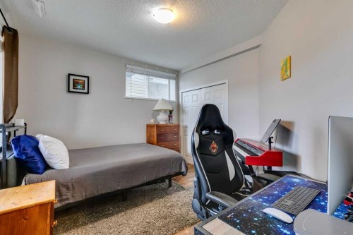 100 Royal Oak Terrace Nw, Calgary, AB - Indoor Photo Showing Bedroom