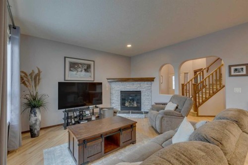 100 Royal Oak Terrace Nw, Calgary, AB - Indoor Photo Showing Living Room With Fireplace
