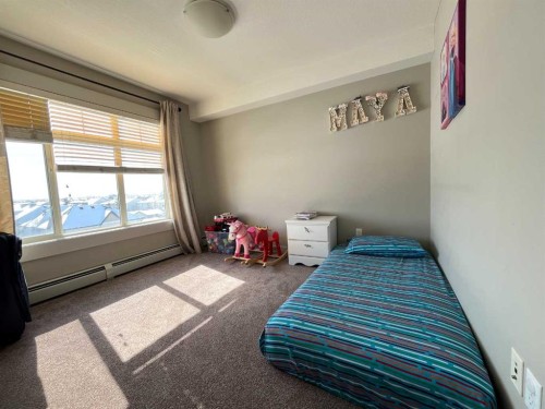 1406-155 Skyview Ranch Way Ne, Calgary, AB - Indoor Photo Showing Bedroom