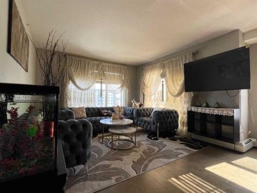 1406-155 Skyview Ranch Way Ne, Calgary, AB - Indoor Photo Showing Living Room With Fireplace