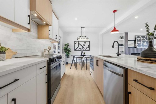 8616 7 Street Sw, Calgary, AB - Indoor Photo Showing Kitchen With Upgraded Kitchen