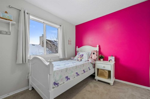 8 Chapalina Crescent Se, Calgary, AB - Indoor Photo Showing Bedroom