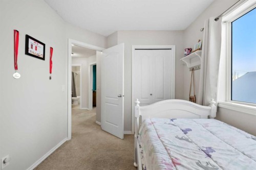 8 Chapalina Crescent Se, Calgary, AB - Indoor Photo Showing Bedroom