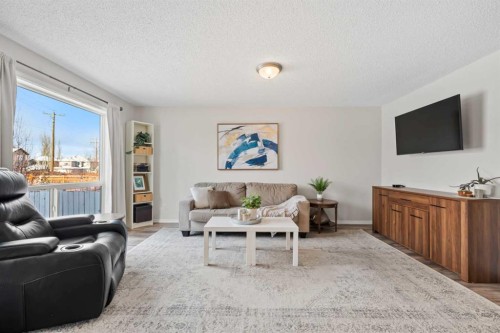 8 Chapalina Crescent Se, Calgary, AB - Indoor Photo Showing Living Room