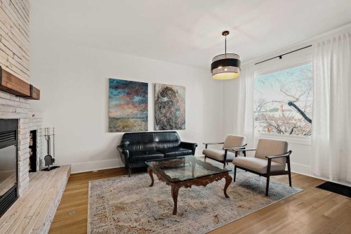 1509 19 Avenue Sw, Calgary, AB - Indoor Photo Showing Living Room With Fireplace