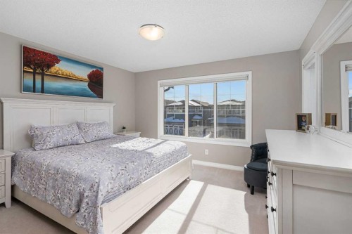 58 Kingfisher Crescent Se, Airdrie, AB - Indoor Photo Showing Bedroom