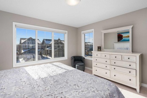 58 Kingfisher Crescent Se, Airdrie, AB - Indoor Photo Showing Bedroom