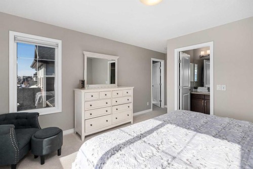 58 Kingfisher Crescent Se, Airdrie, AB - Indoor Photo Showing Bedroom