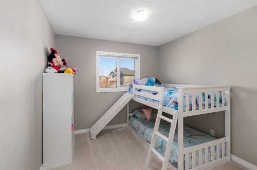 58 Kingfisher Crescent Se, Airdrie, AB - Indoor Photo Showing Bedroom