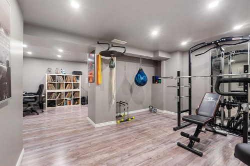 58 Kingfisher Crescent Se, Airdrie, AB - Indoor Photo Showing Gym Room