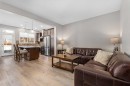 58 Kingfisher Crescent Se, Airdrie, AB  - Indoor Photo Showing Living Room 
