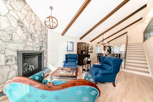 332 Varsity Close Nw, Calgary, AB - Indoor Photo Showing Living Room With Fireplace