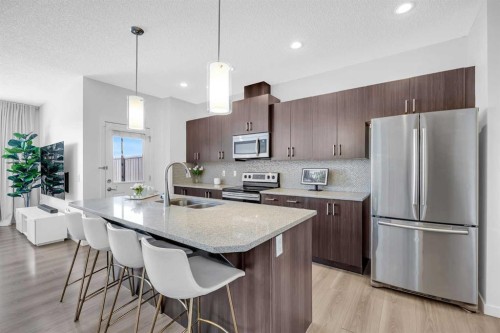 226 Auburn Crest Way Se, Calgary, AB - Indoor Photo Showing Kitchen With Stainless Steel Kitchen With Double Sink With Upgraded Kitchen