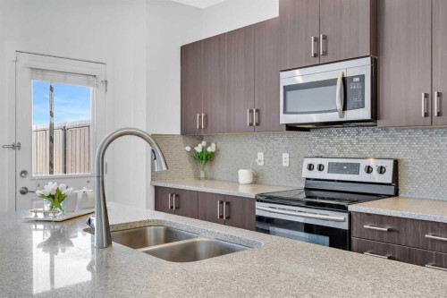 226 Auburn Crest Way Se, Calgary, AB - Indoor Photo Showing Kitchen With Stainless Steel Kitchen With Double Sink With Upgraded Kitchen