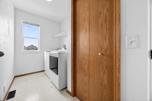 162 Prestwick Landing Se, Calgary, AB - Indoor Photo Showing Laundry Room