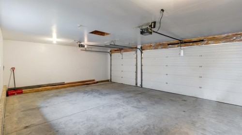 162 Prestwick Landing Se, Calgary, AB - Indoor Photo Showing Garage
